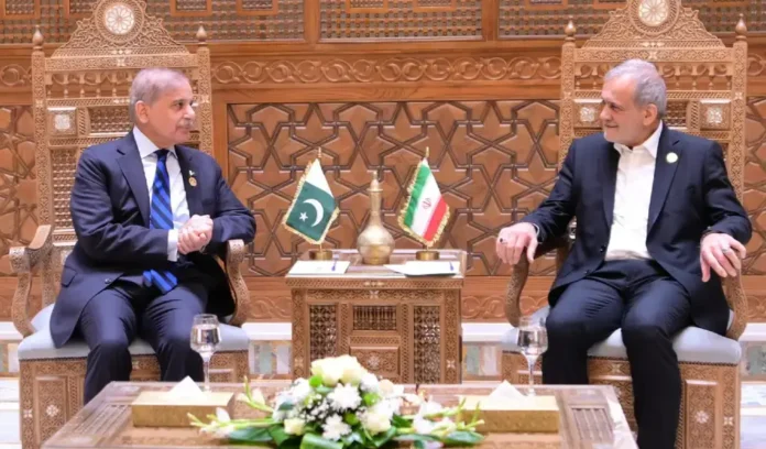 Prime Minister Shehbaz Sharif meets Iranian President Masoud Pezeshkian at the D-8 Summit, discussing trade, security, and regional issues.